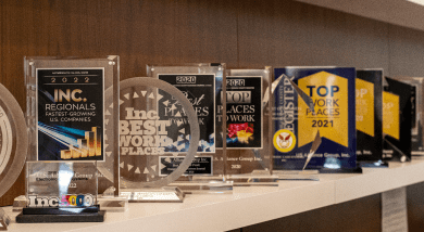 Various plaques of USAG's awards over the years.